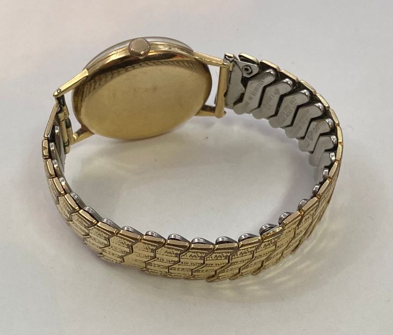 14 k Gull Tissot med strekklenke